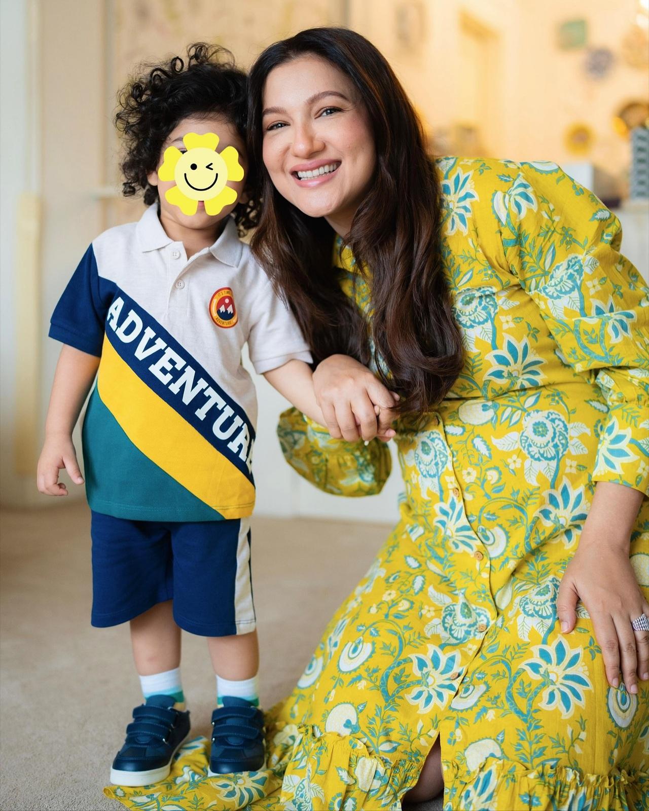 Gauahar Khan looks like a bright ray of light in this yelow maternity wear. She beams with joy as she poses with Zehaan while enjoying pregnancy phase. 